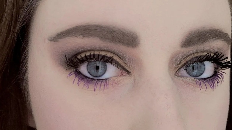 Purple mascara on lower lashes 