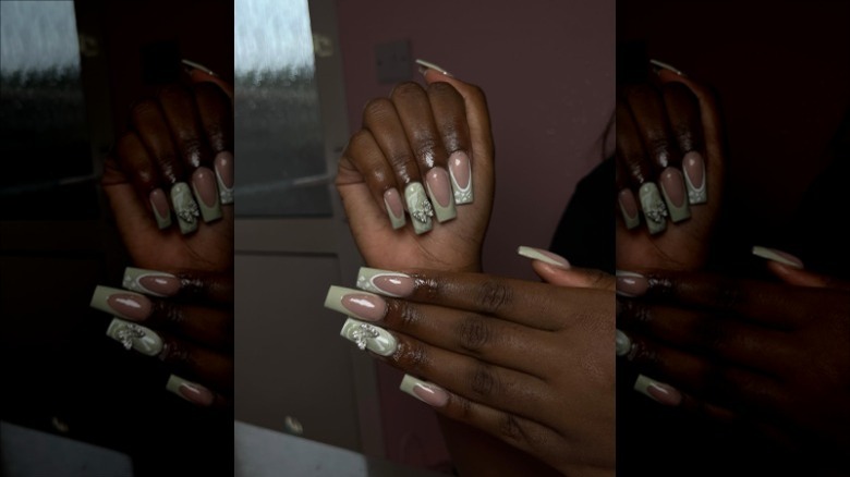 Matcha latte nails with butterfly charms 