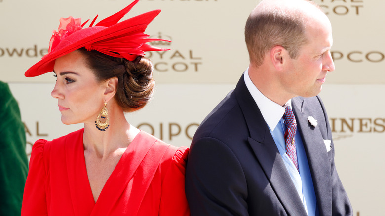 Kate Middleton and Prince William backs turned toward one another