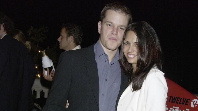 Matt Damon and Luciana Barroso stand close together