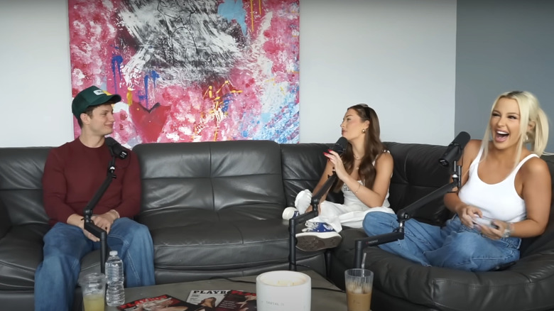 Matt Rife speaking with Brooke Schofield (L) and Tana Mongeau (R) on their podcast