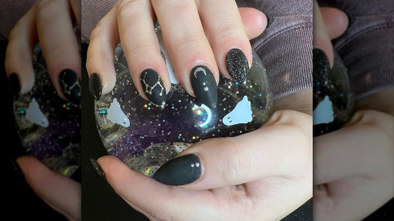 Black nails with Sagittarius constellation