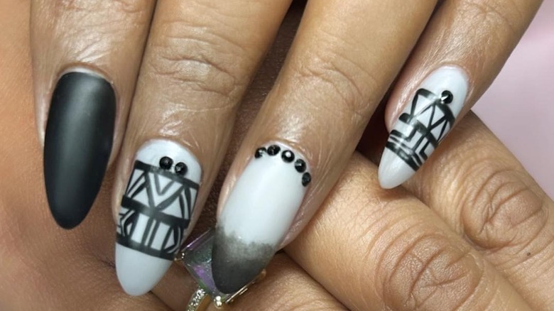 Black and white nails with tribal designs