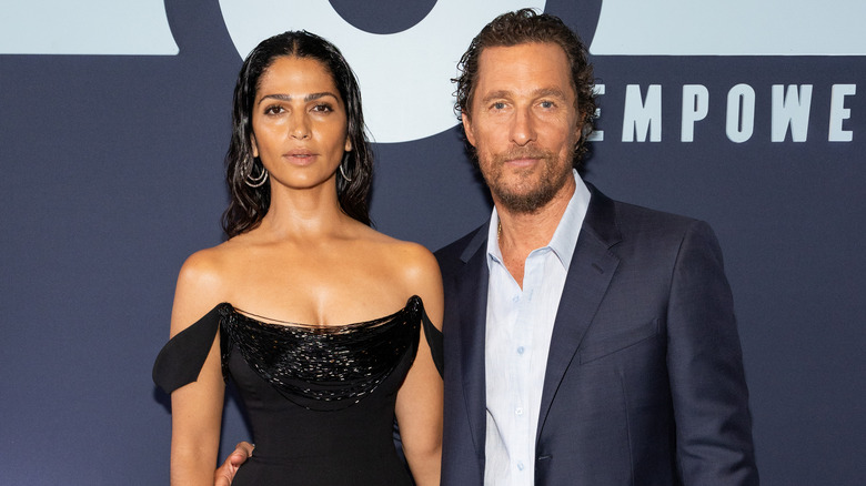 McConaughey posing with his wife Camila Alves