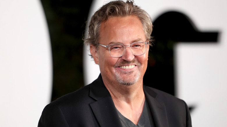 Matthew Perry smiles during GQ event