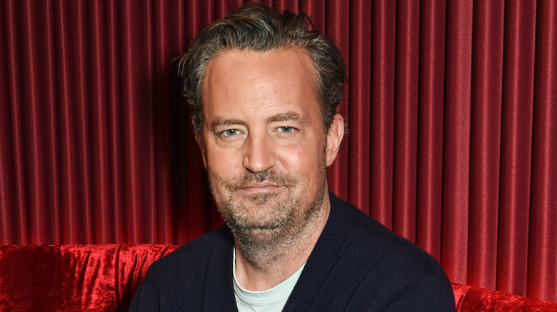 Matthew Perry smiling in close-up