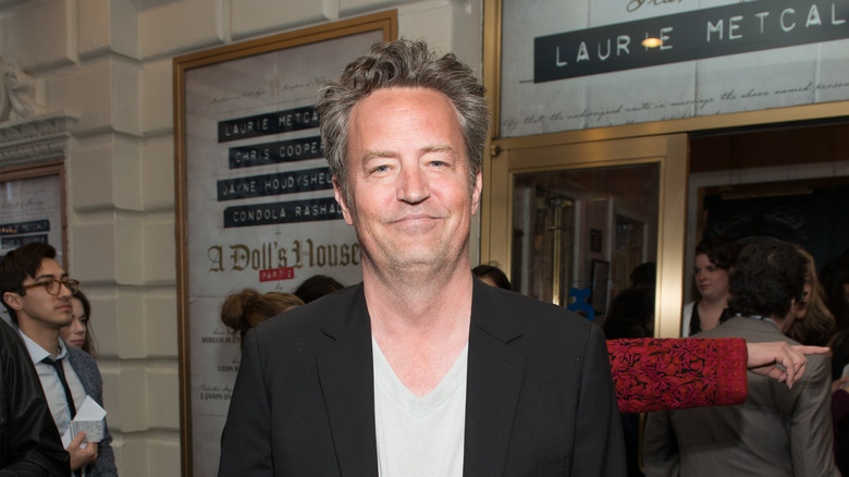 Matthew Perry smiles