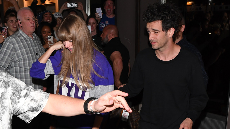 Taylor Swift walking with Matty Healy