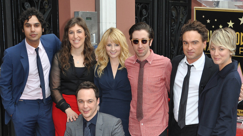 The cast of The Big Bang Theory posing on Hollywood Boulevard