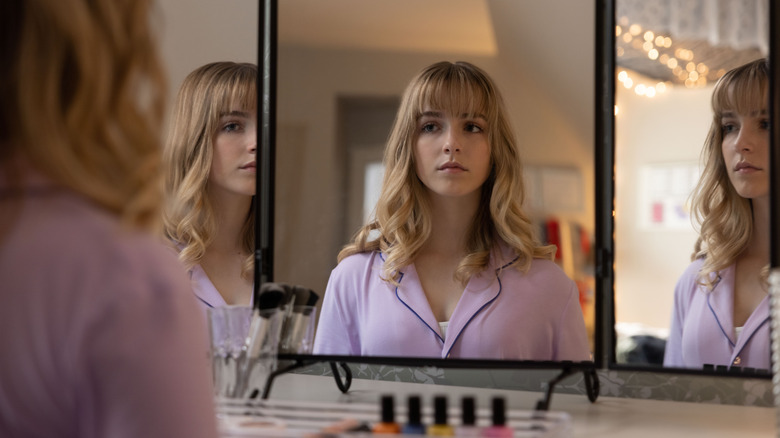 Emma looking in a mirror in The Bad Seed Returns