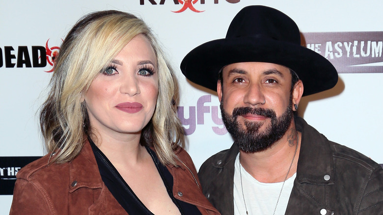 aj mclean with his wife