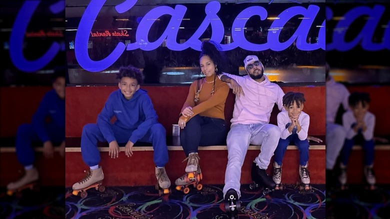 Alicia Keys and Swizz Beatz with kids at skating rink