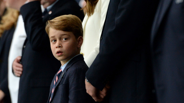 Prince George with his parents 