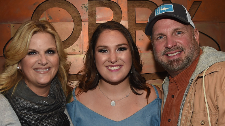 Trisha Yearwood, Allie Colleen Brooks, and Garth Brooks 