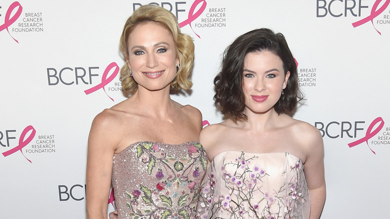 Amy Robach and daughter Ava pose smiling side by side at Breast Cancer Research Event