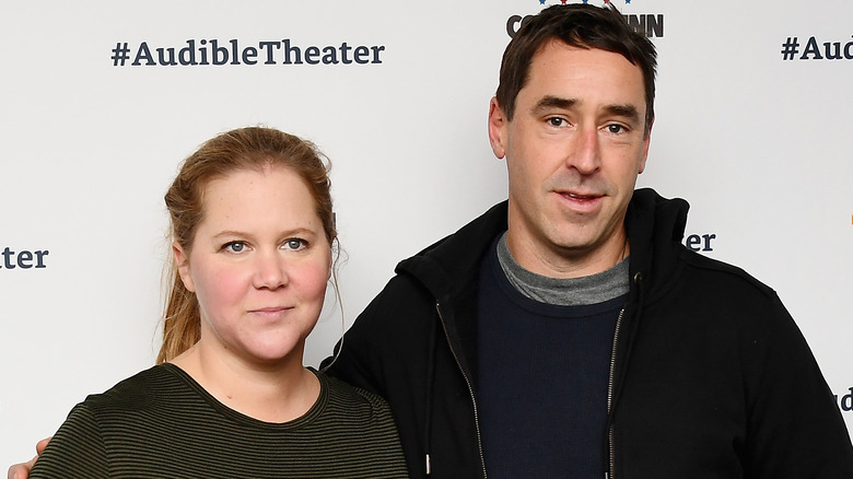 amy schumer chris fischer posing