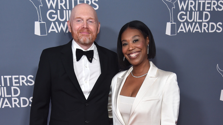 Bill Burr and Nia Renée Hill smiling