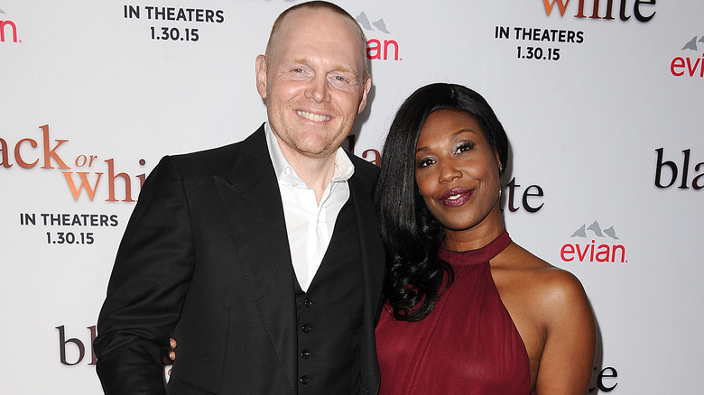 Bill Burr and Nia Renée Hill smiling