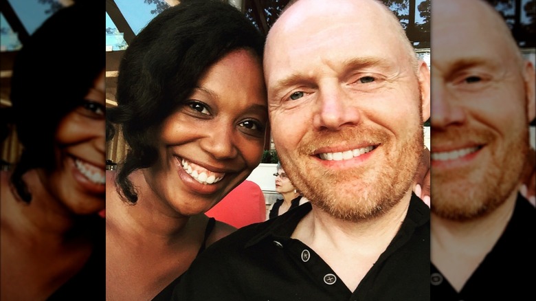 Bill Burr and Nia Renée Hill smiling