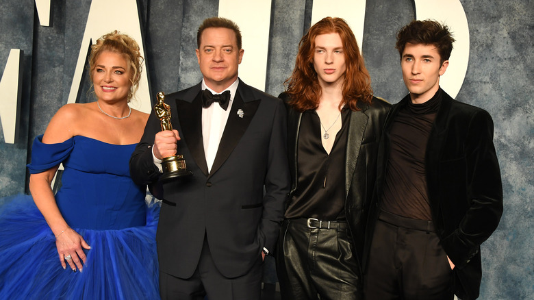 Brendan Fraser with Jeanne Moore and his sons 