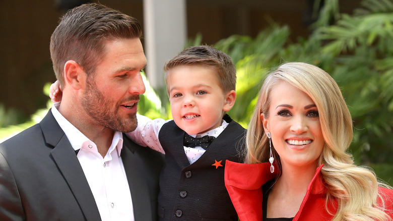 Mike Fisher, Isaiah Fisher, and Carrie Underwood