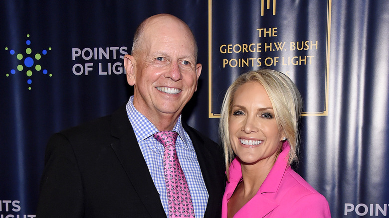 Dana Perino and Peter McMahon posing at an event