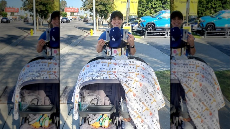 Danielle Fishel pushing her children in a stroller