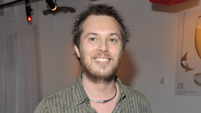 Duncan Jones smiling with spiked hair 