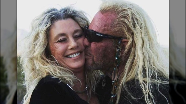 Dog the Bounty Hunter kissing Francie Frane