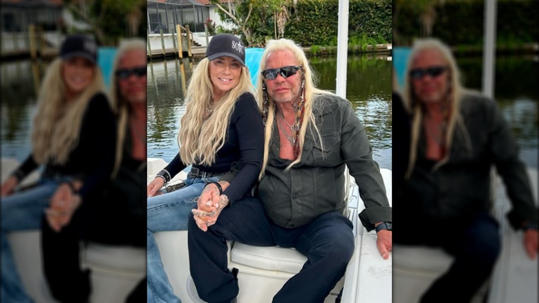 Dog the Bounty Hunter holding hands with Francie Frane