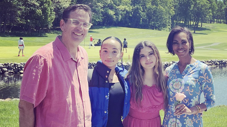 (L-R) Tony Berlin, Danika, Bella, and Harris Faulkner pose for family photo