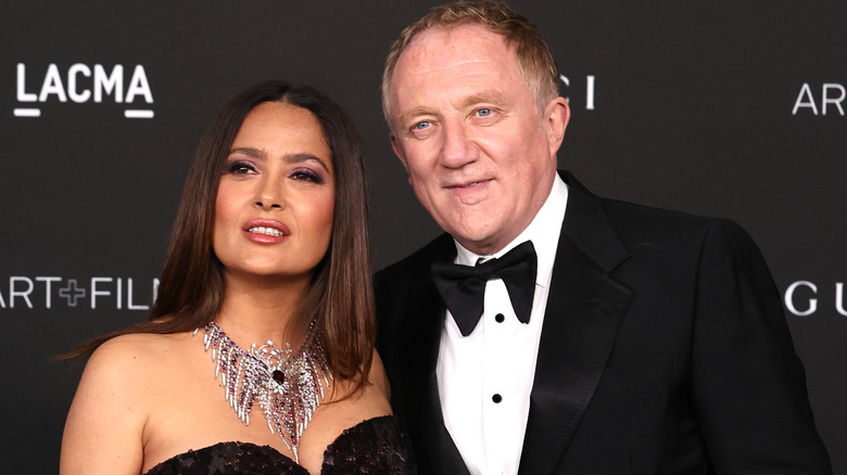 Salma Hayek and François-Henri Pinault posing at an event