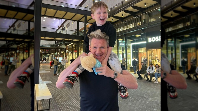 Oscar Ramsay rides on his dad's shoulders