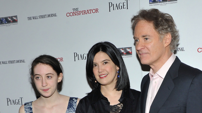 Greta Kline attends a premiere with her parents in 2011