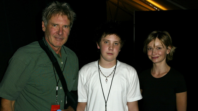 Harrison Ford, Malcolm Ford, and Calista Flockhart smiling