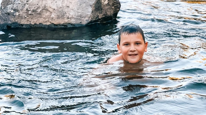 South Dozier smiles while swimming