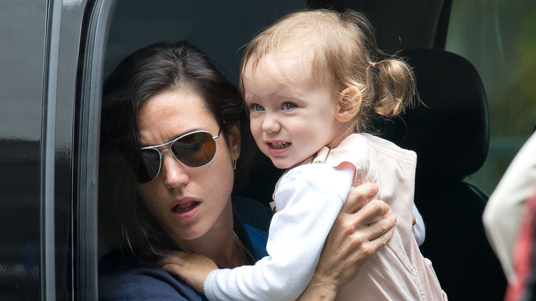 Jennifer Connelly carrying Agnes Bettany