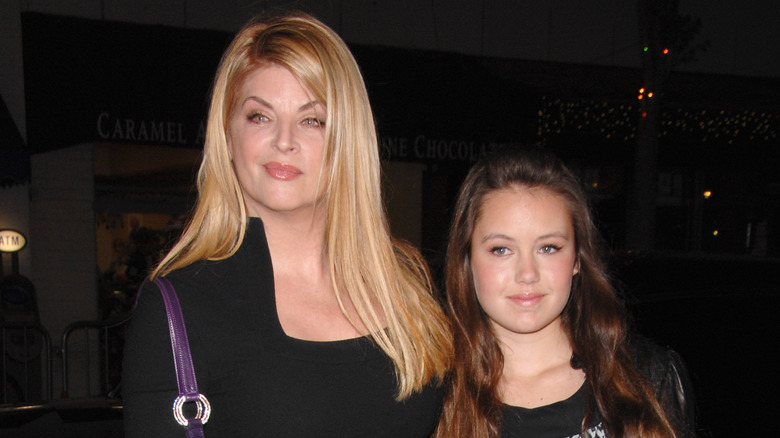 Kirstie Alley and her daughter Lillie smiling slightly