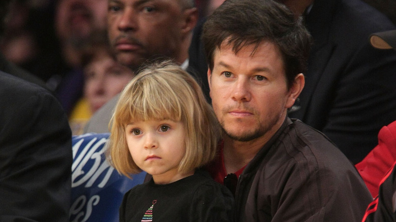 Mark Wahlberg holding Ella Wahlberg