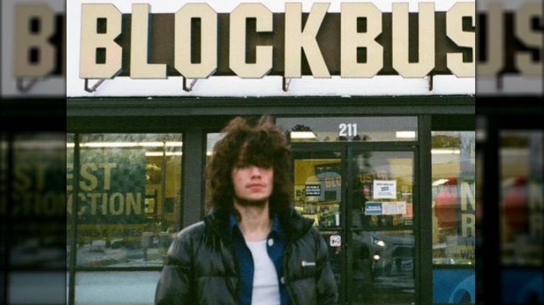 Maxx Morando in front of Blockbuster