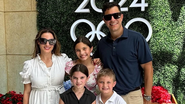 Tom Llamas attends the 2024 Olympics with wife and children