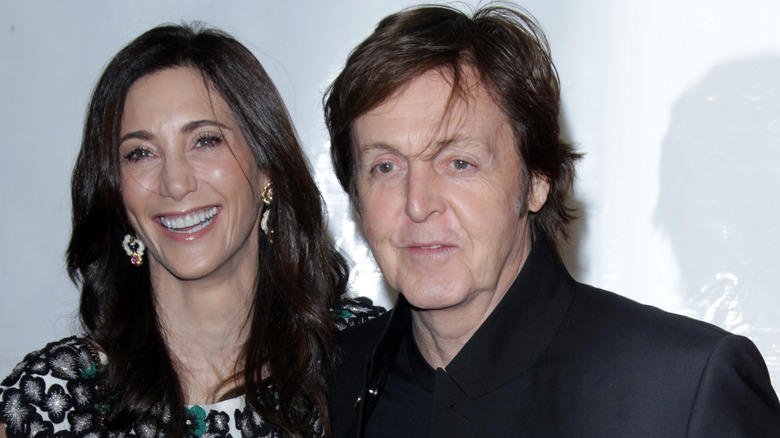 Nancy Shevell smiling with Paul McCartney