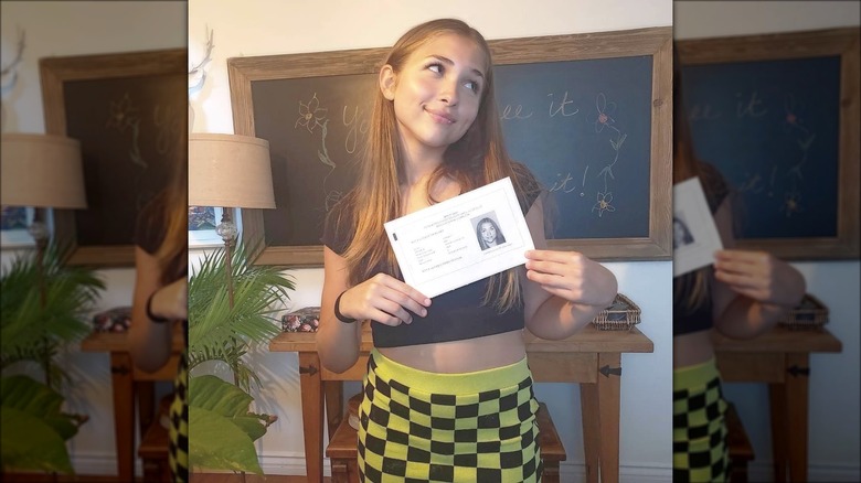 Carmen Blanchard showing off driver's permit