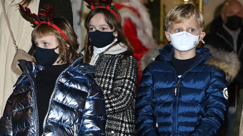 Gabriella and Jacques wearing masks