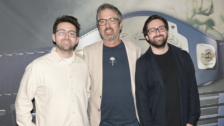 Ray Romano posing for photos with Gregory and Matthew Romano