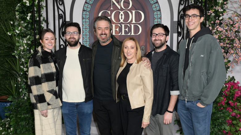 Ray Romano posing for photos with his family