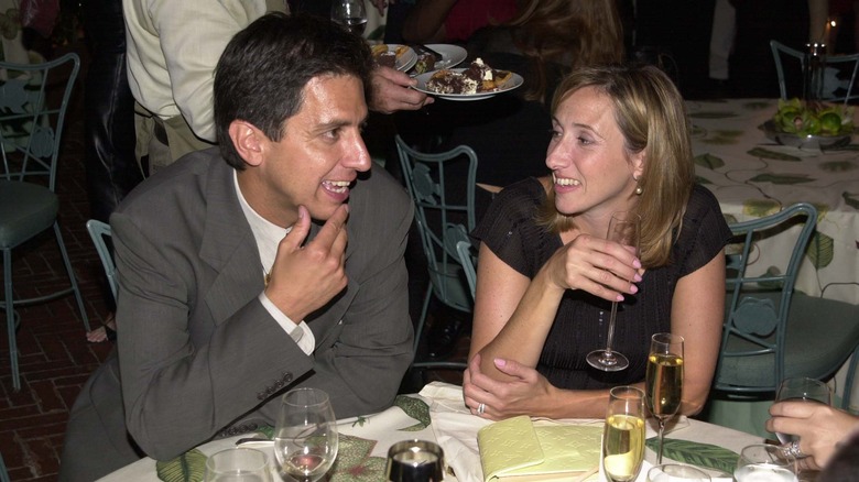 Anna Romano and Ray Romano eating dinner