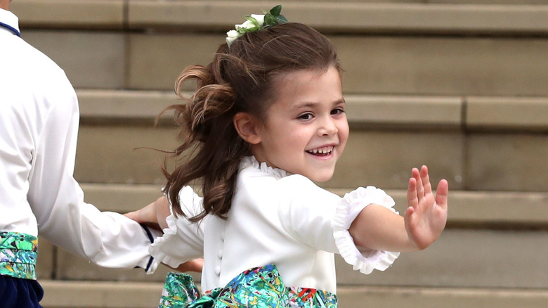 Theodora Williams waving 