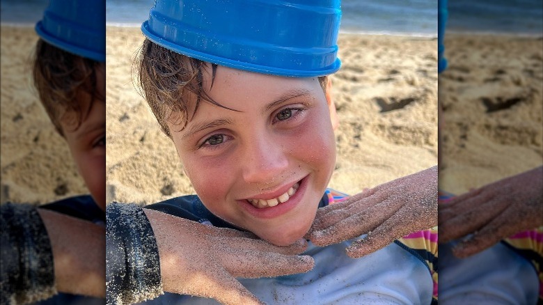 Exton Downey smiling with bucket on head