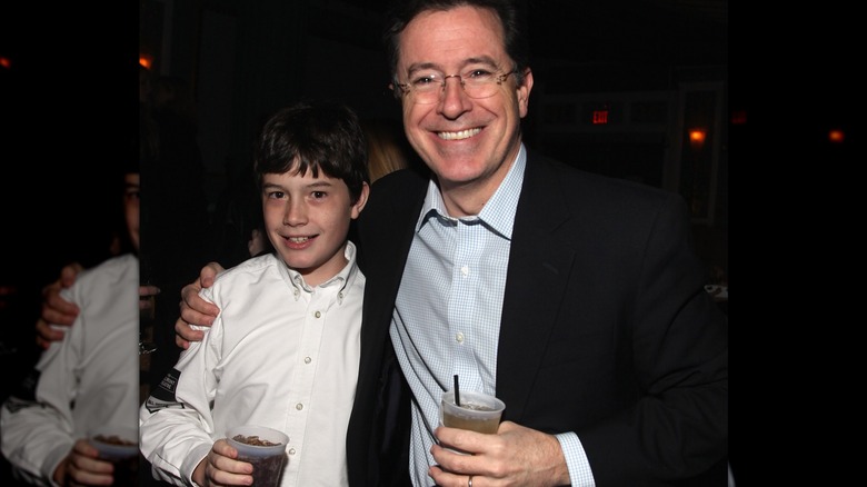 Stephen and Peter Colbert smiling